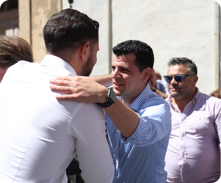 Beppe Galea embracing Alex Borg