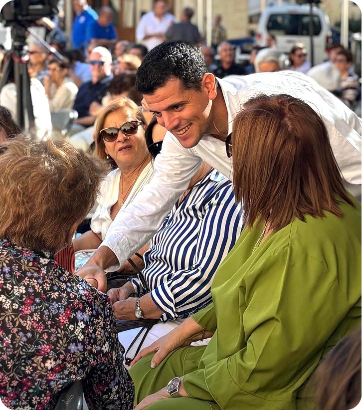 Beppe greeting members of the public